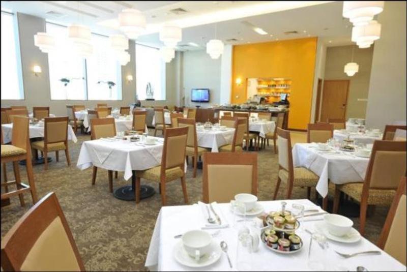 Fraser Suites Seef Bahrain Manamah Buitenkant foto The dining room at the International House