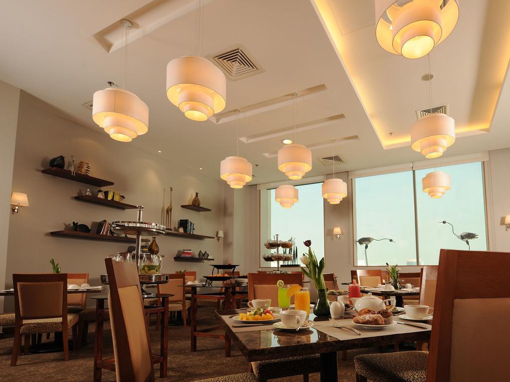 Fraser Suites Seef Bahrain Manamah Buitenkant foto The restaurant