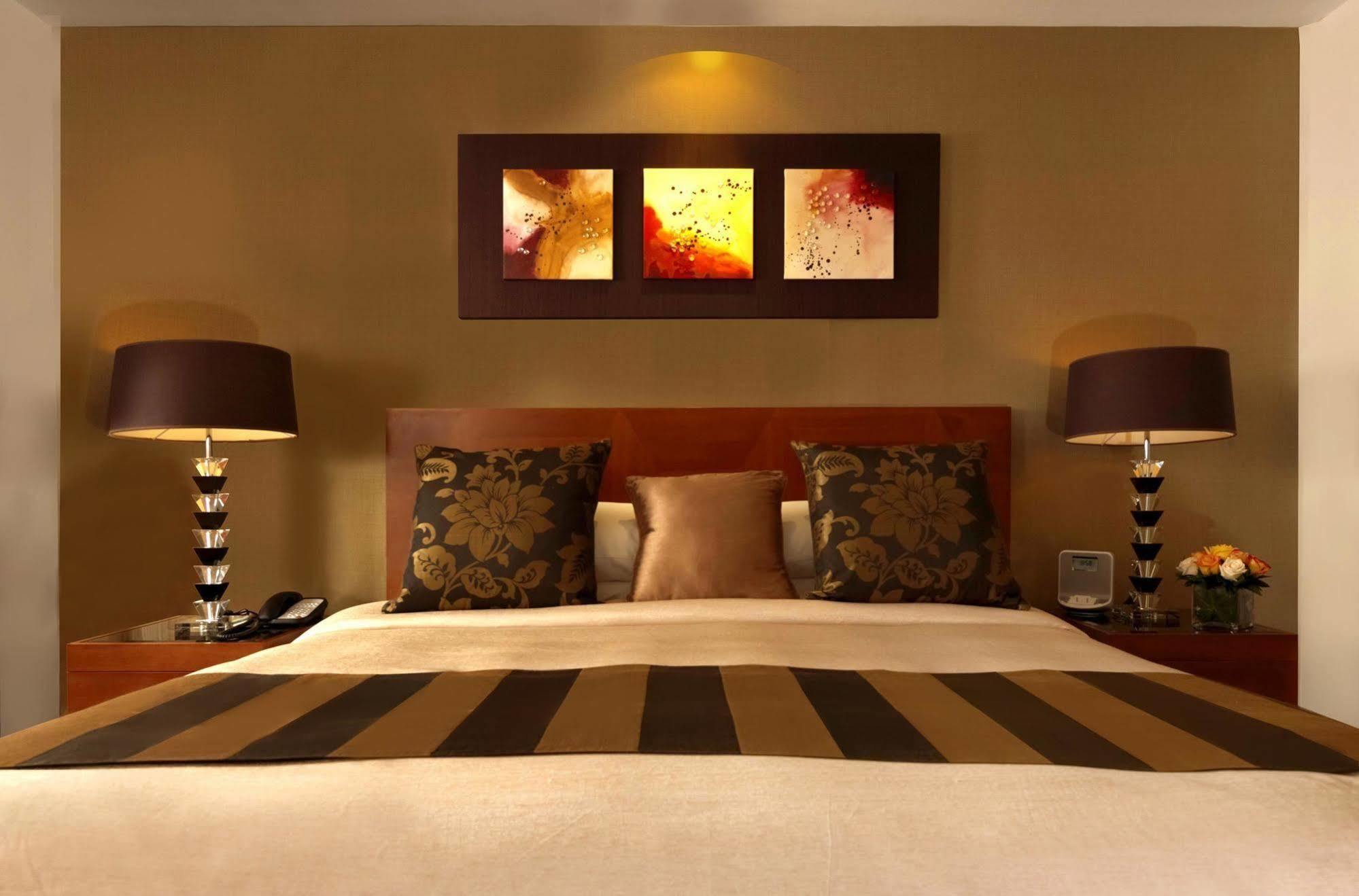Fraser Suites Seef Bahrain Manamah Buitenkant foto A bedroom