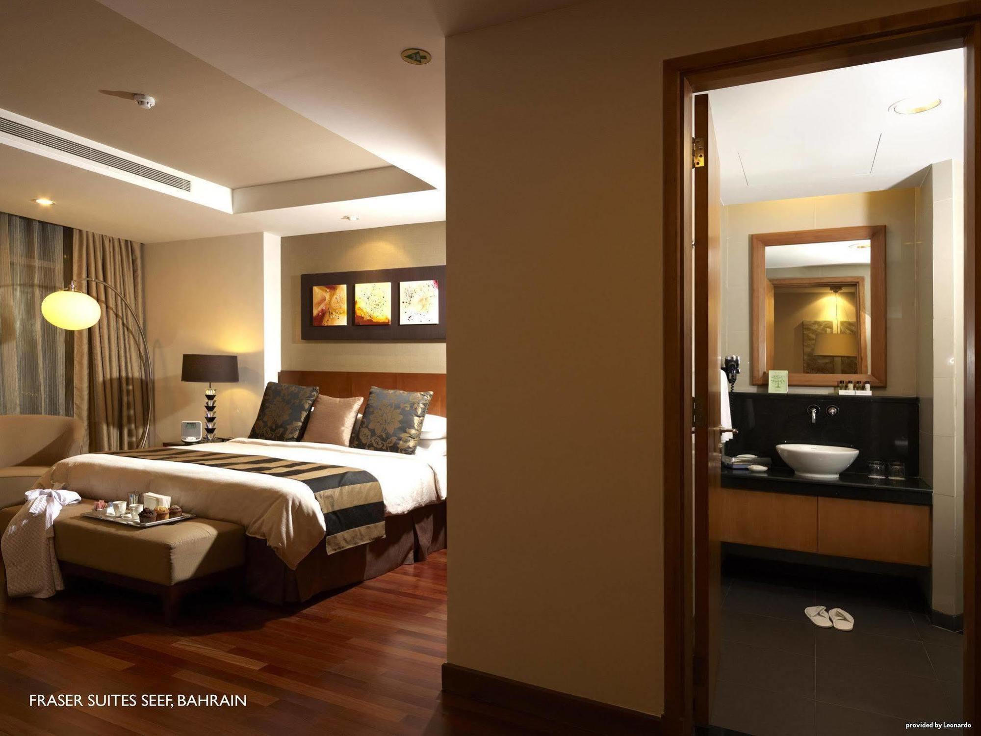 Fraser Suites Seef Bahrain Manamah Buitenkant foto A bedroom in Fraser Suites