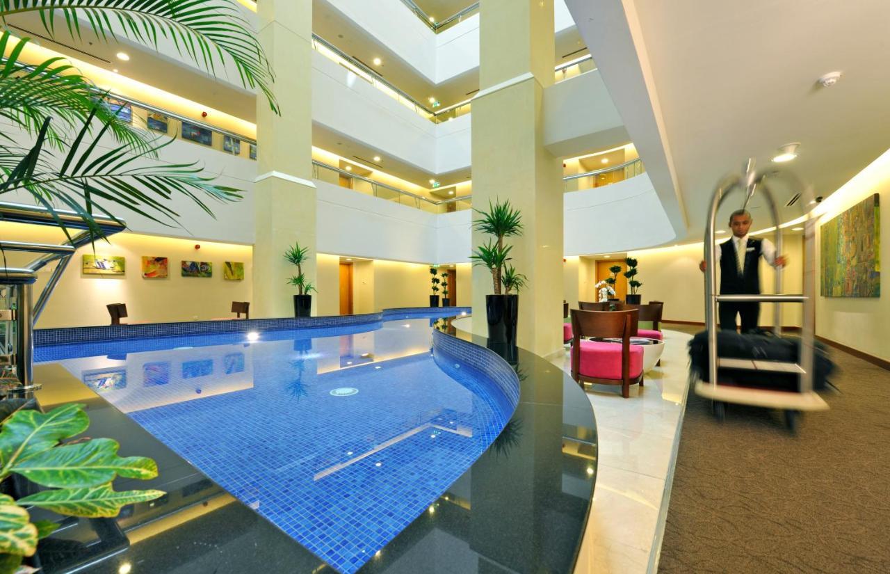 Fraser Suites Seef Bahrain Manamah Buitenkant foto Lobby